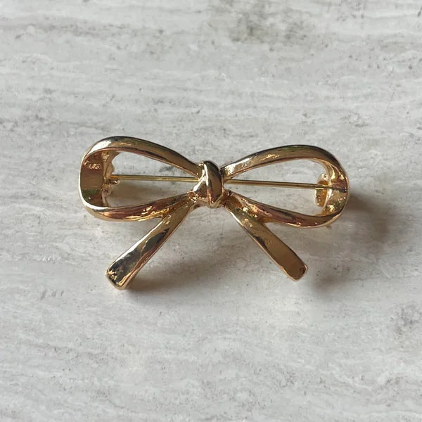 Kleine strik broche goud