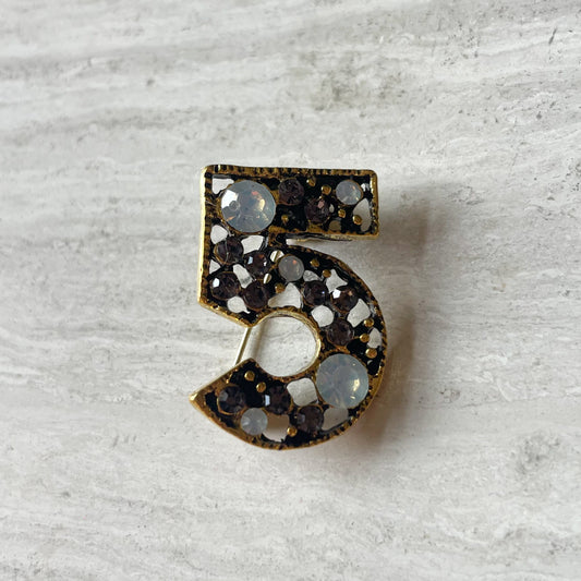 Number 5 broche