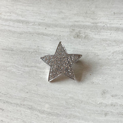 Glitterende ster broche